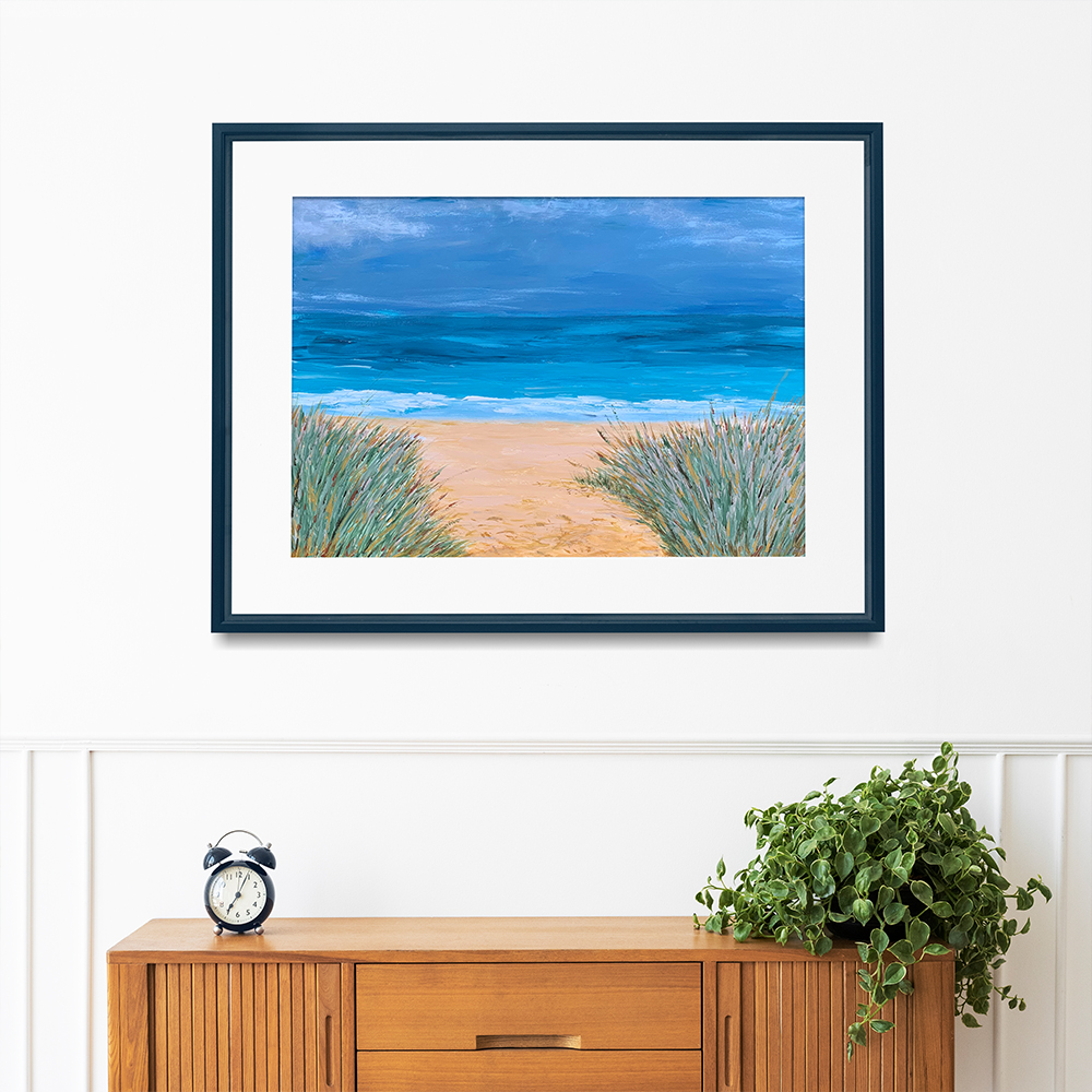 Along the Coastal Path print over sideboard with clock